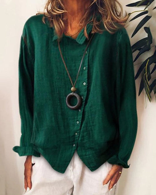 Lucia - Dames loszittende blouse in groen met knopen en lange mouwen