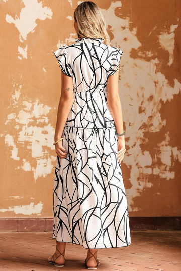 Kathleen - Maxi-jurk met abstracte V-halslijn