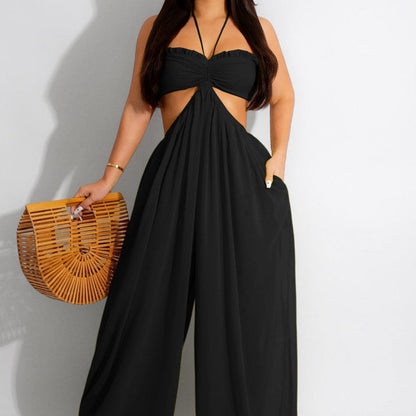 Alia - Off-the-shoulder jumpsuit met wijde pijpen