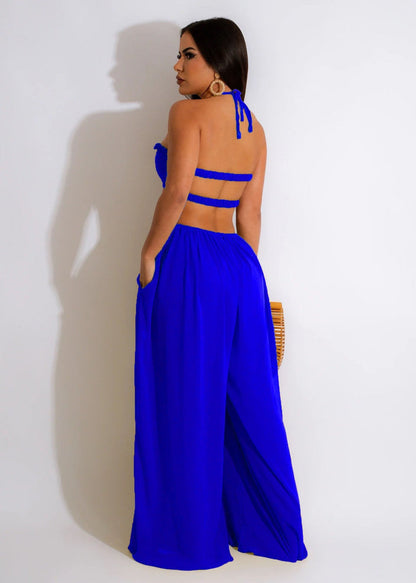 Alia - Off-the-shoulder jumpsuit met wijde pijpen