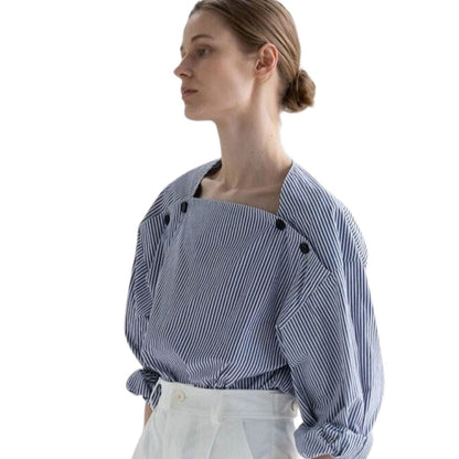 Wira - Elegante oversized blouse met schouderknoop