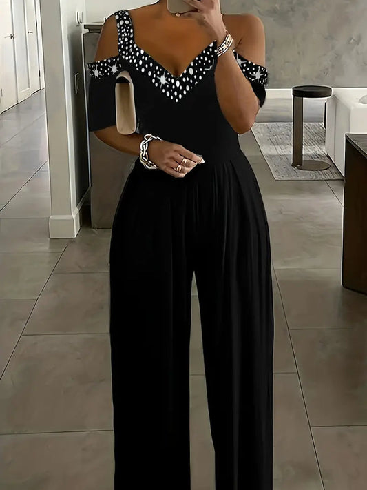 Renske - Elegante, off-the-shoulder jumpsuit met stippenprint