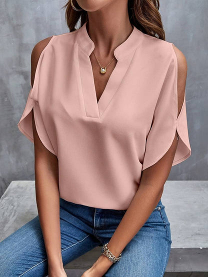 Kris - Effen blouse met inkepingen en eenvoudige elegante split mouwen