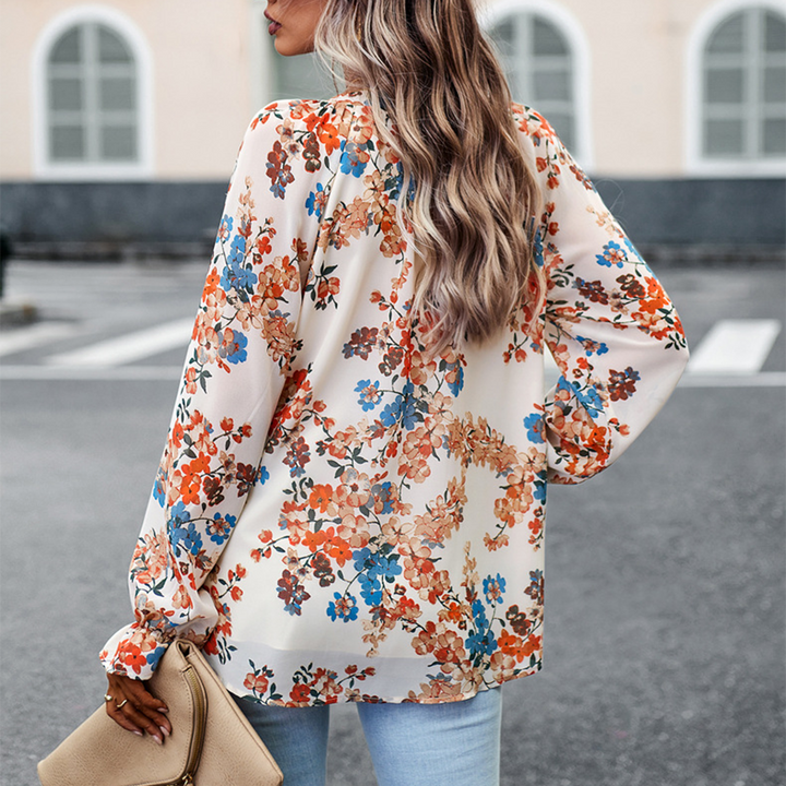 Laura elizabeth - Gebloemde blouse met V-hals en pofmouwen